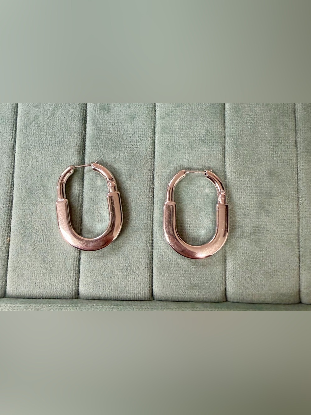 Sleek Silver Oval Hinge Hoop Earrings